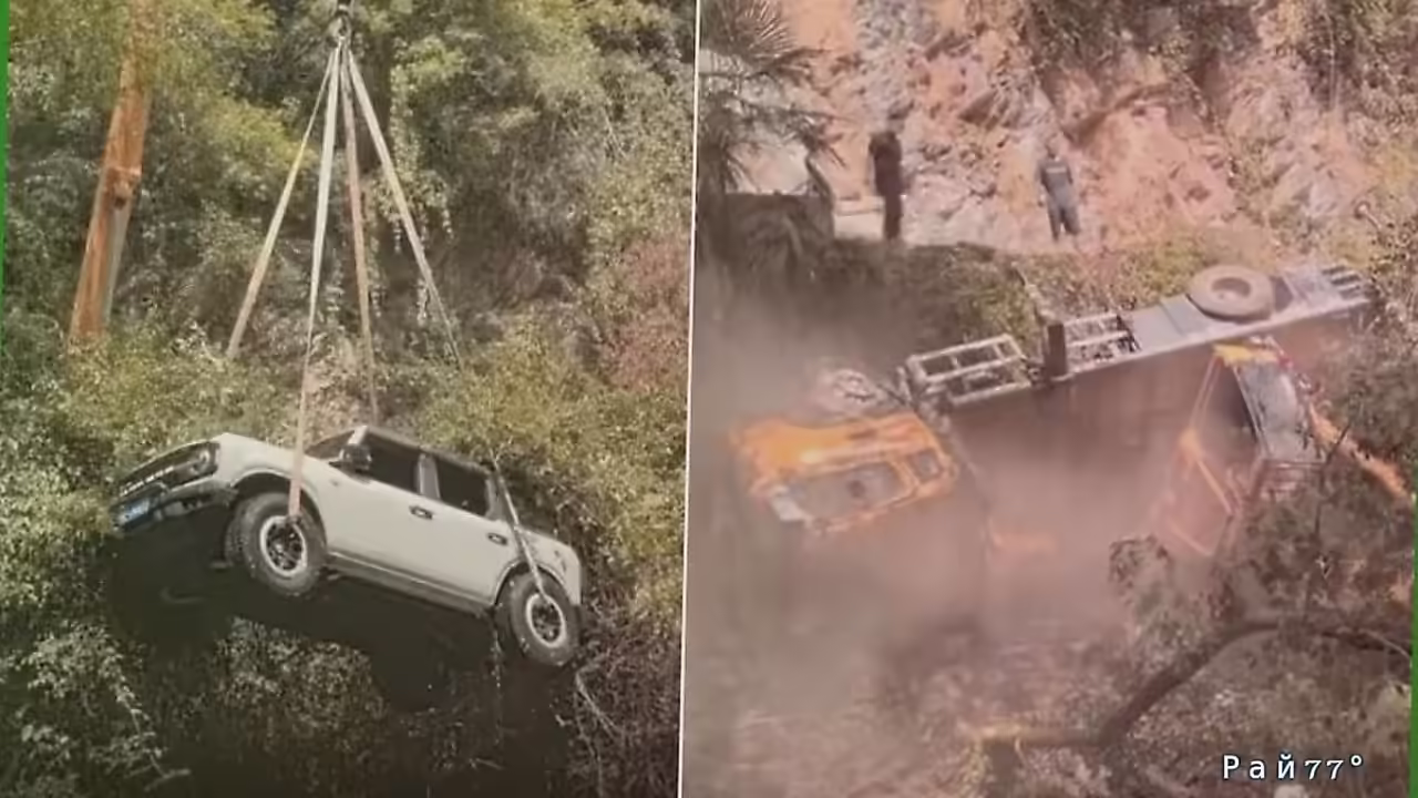 Обрушение в водоём автокрана, вытаскивающего автомобиль, попало на видео в Китае